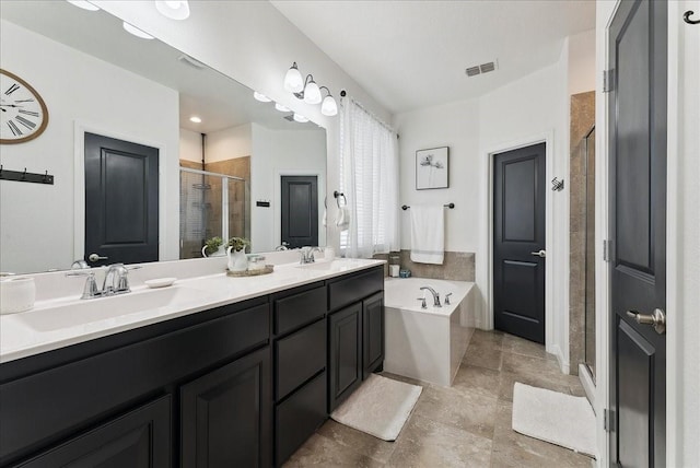 full bathroom featuring a sink, visible vents, a shower stall, a bath, and double vanity