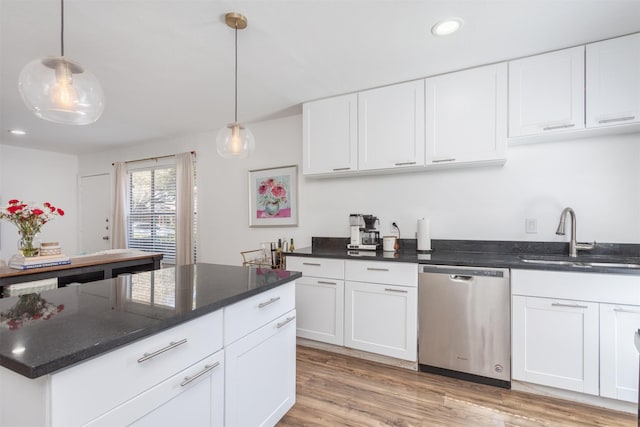 kitchen with white cabinetry, dishwasher, light wood-style flooring, and a sink