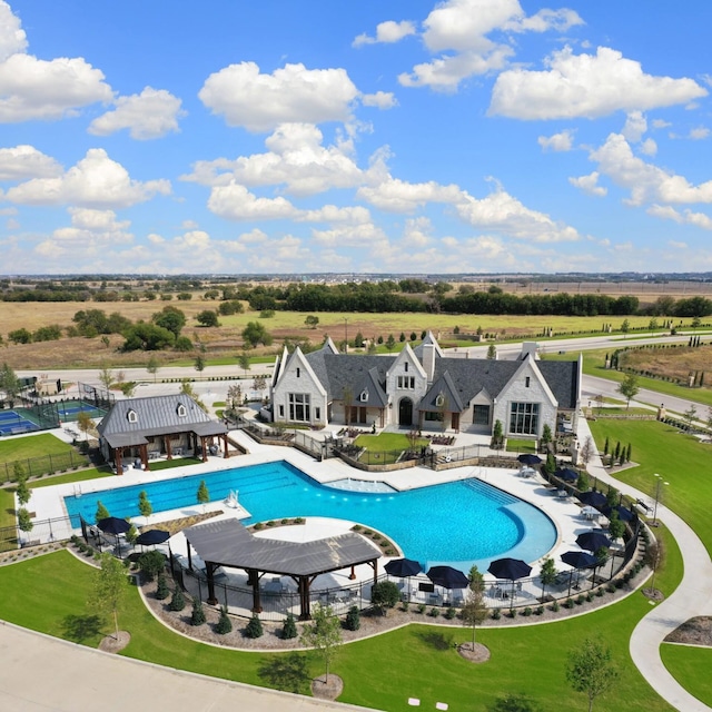 view of pool featuring a patio, fence, and a fenced in pool