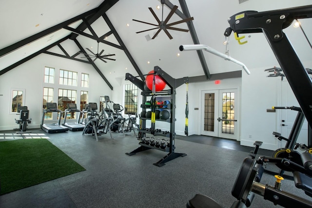 gym with high vaulted ceiling, baseboards, and french doors