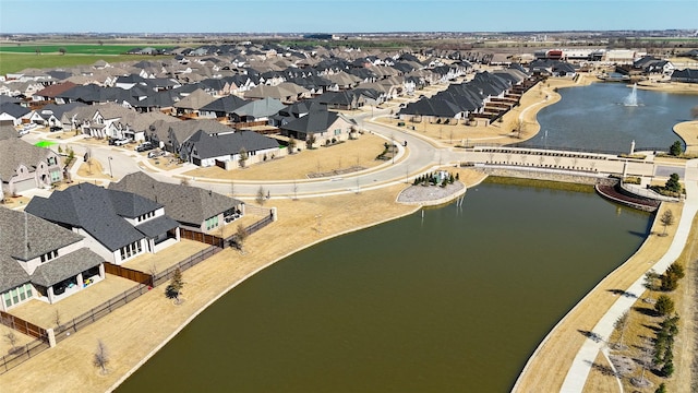 aerial view featuring a water view and a residential view