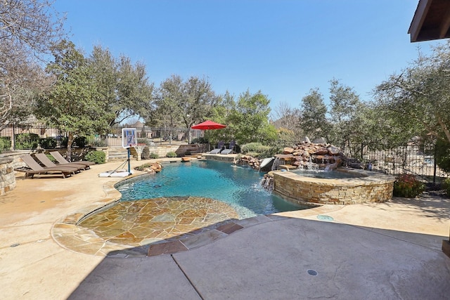 view of pool with a patio area, fence, and a fenced in pool