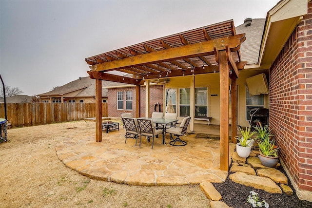 view of patio / terrace with outdoor dining space, fence, and a pergola