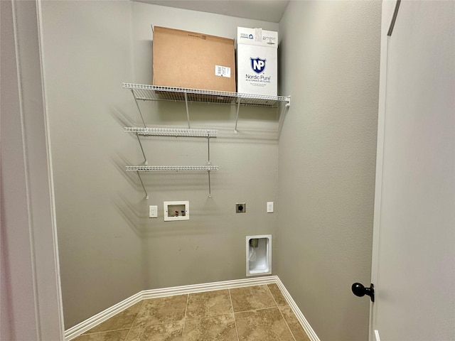 washroom featuring washer hookup, hookup for an electric dryer, laundry area, baseboards, and tile patterned floors