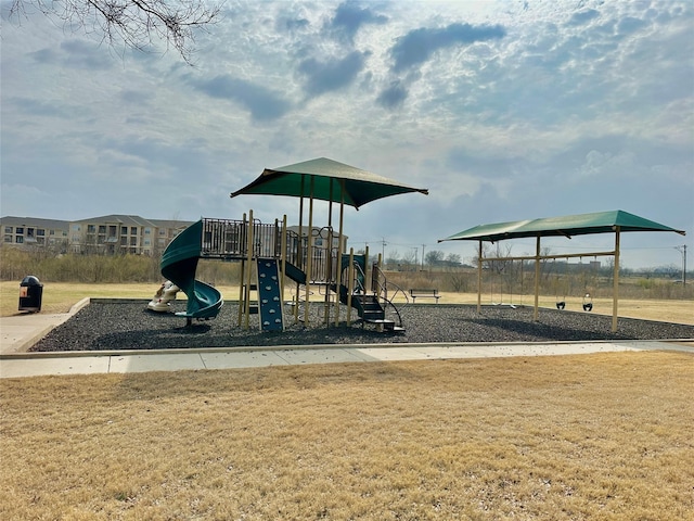 communal playground with a lawn