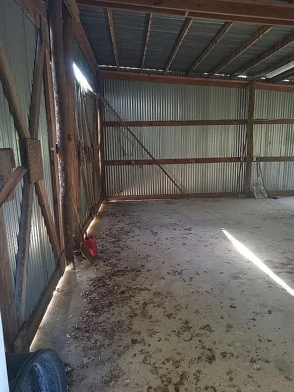 garage featuring metal wall