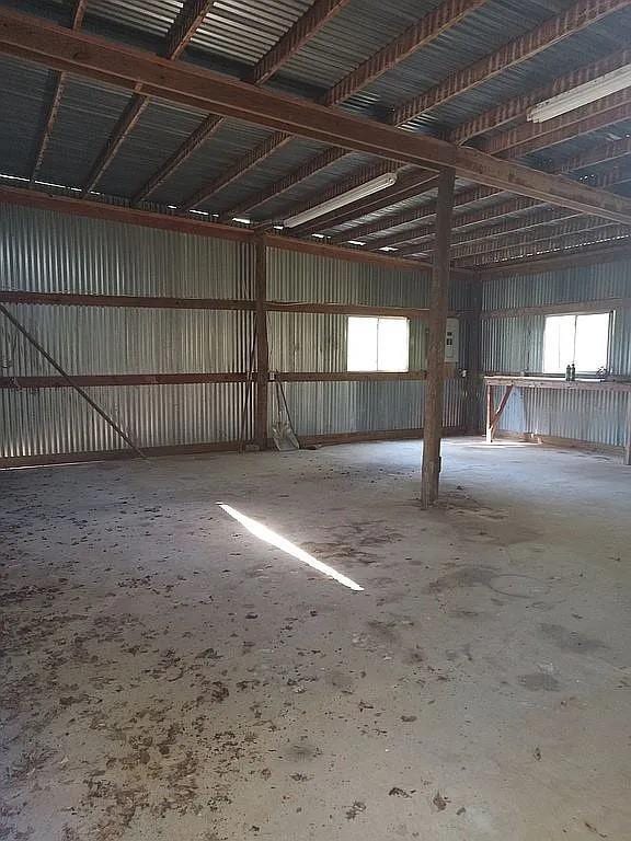 garage with metal wall