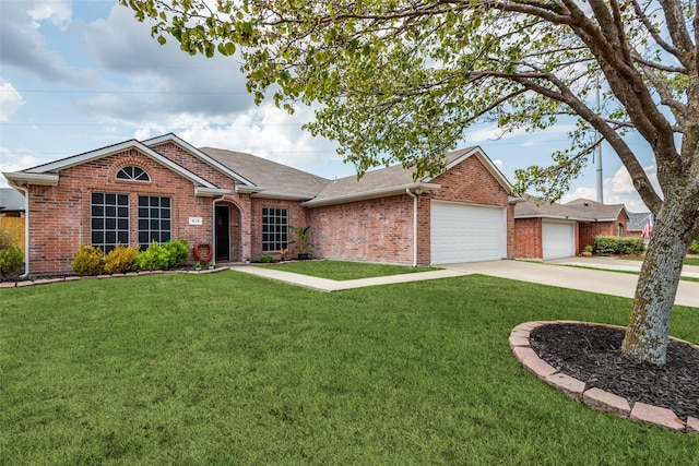 ranch-style home with a garage, brick siding, driveway, roof with shingles, and a front yard