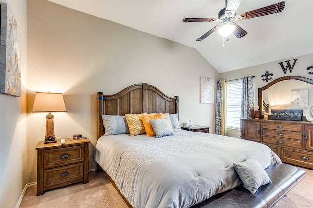 bedroom featuring a ceiling fan, lofted ceiling, light colored carpet, and baseboards