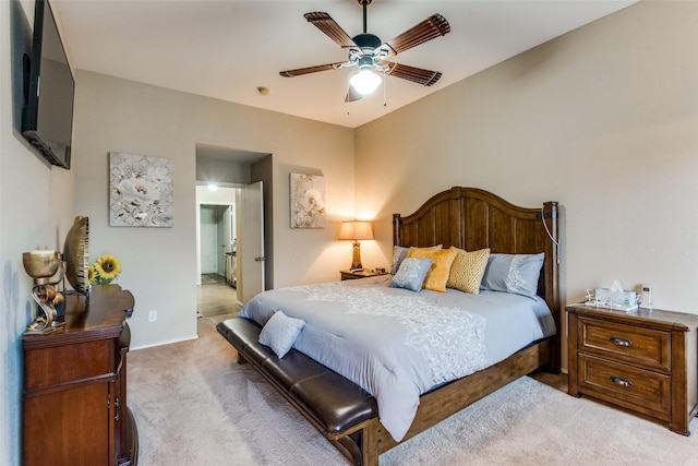 bedroom with baseboards, a ceiling fan, and light colored carpet