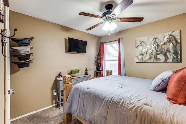 bedroom featuring carpet, ceiling fan, and baseboards