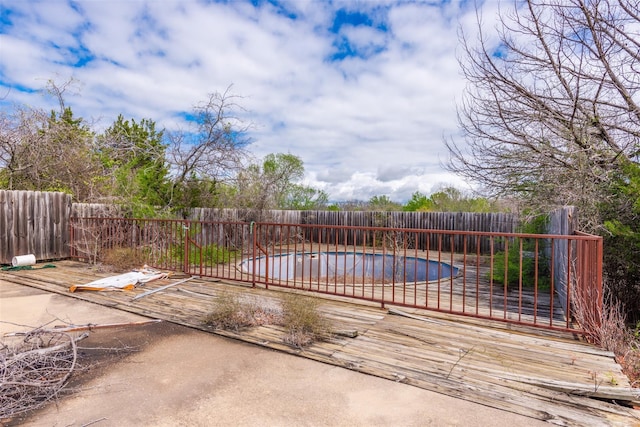 view of swimming pool with a fenced in pool, a patio area, and a fenced backyard