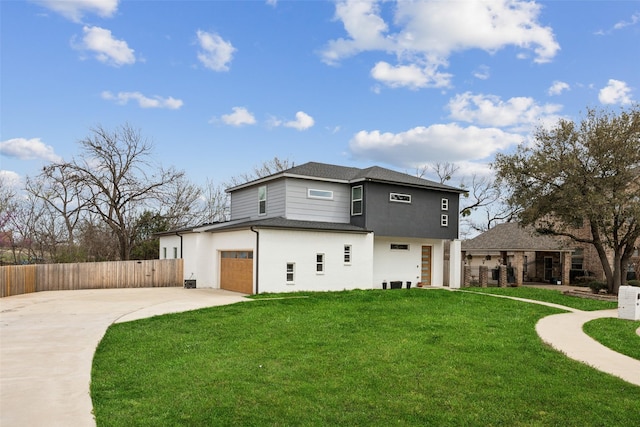 view of property exterior with fence, concrete driveway, roof with shingles, a lawn, and an attached garage