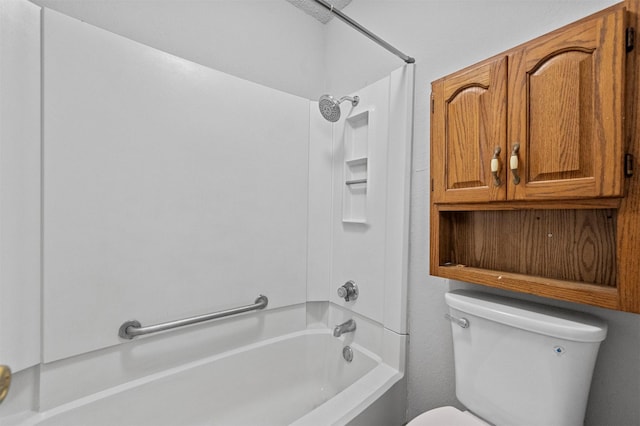 bathroom featuring toilet and shower / bath combination