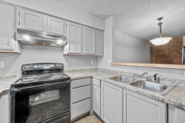 kitchen featuring a textured ceiling, under cabinet range hood, electric range, a sink, and light countertops