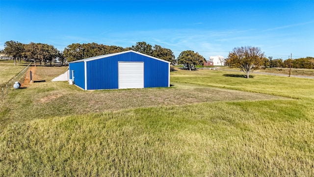 view of pole building featuring a yard