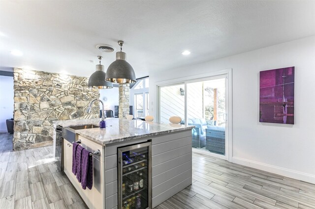 dining area with lofted ceiling with beams, an inviting chandelier, baseboards, and a textured ceiling