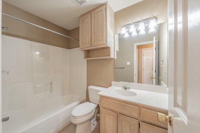 bathroom with visible vents, washtub / shower combination, vanity, and toilet