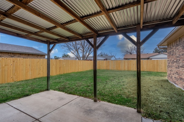 view of yard with a fenced backyard and a patio