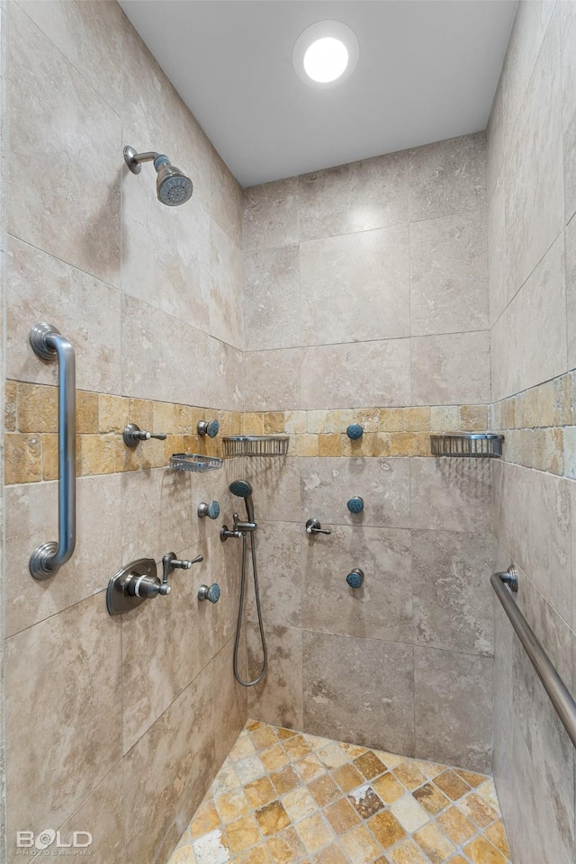 bathroom featuring tiled shower