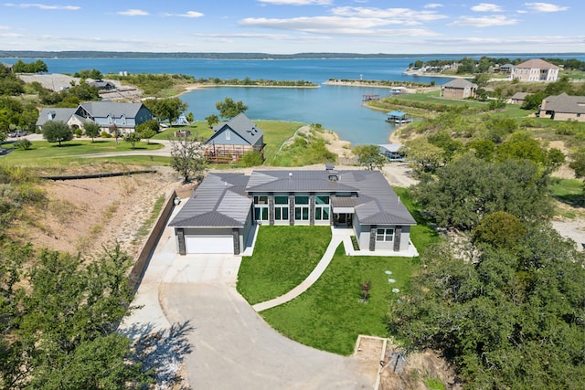 aerial view featuring a water view