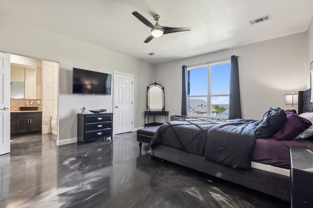 bedroom featuring visible vents, ceiling fan, baseboards, and ensuite bathroom