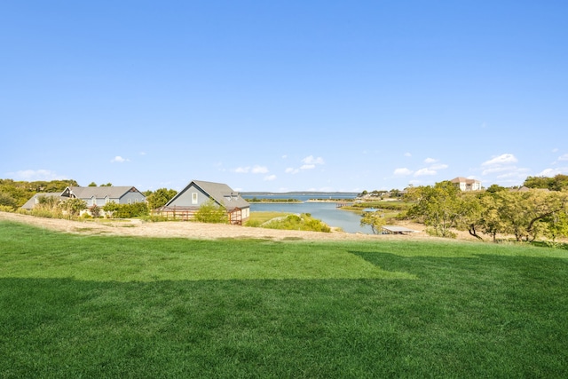 view of yard with a water view