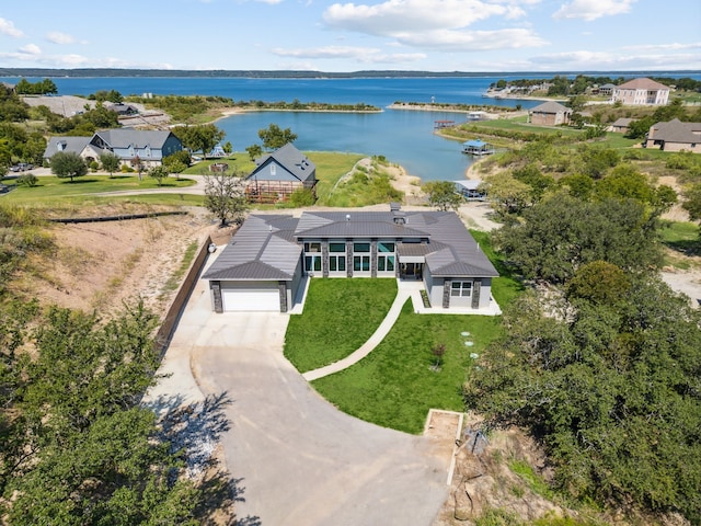 drone / aerial view with a water view