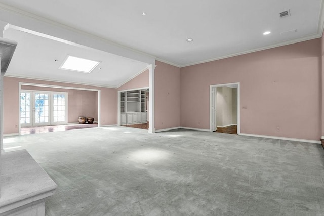 unfurnished living room featuring carpet, visible vents, baseboards, and ornamental molding