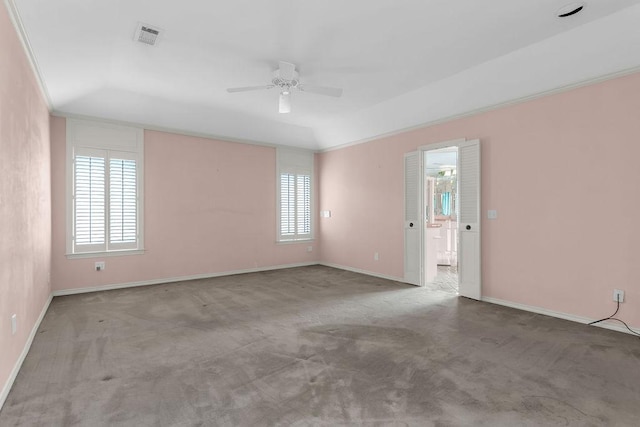 unfurnished room with a ceiling fan, baseboards, visible vents, and carpet flooring