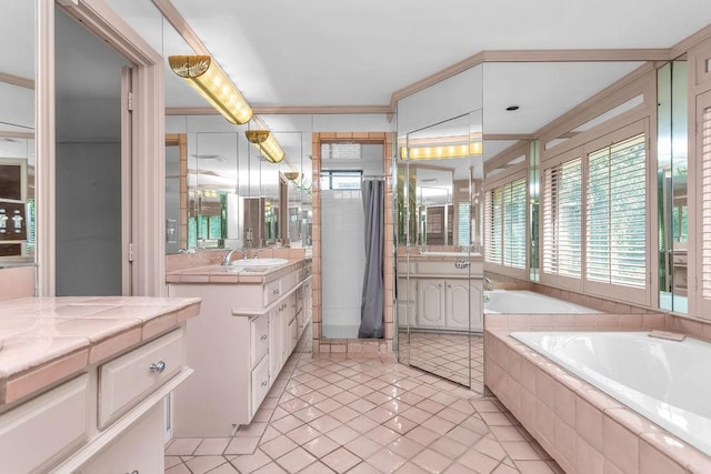 full bath featuring a shower with shower curtain, a garden tub, tile patterned flooring, and vanity