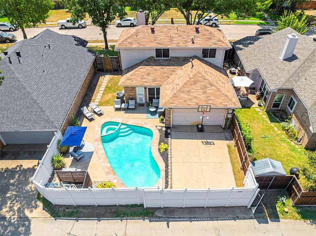 view of pool featuring a fenced backyard, a gate, a fenced in pool, and a patio