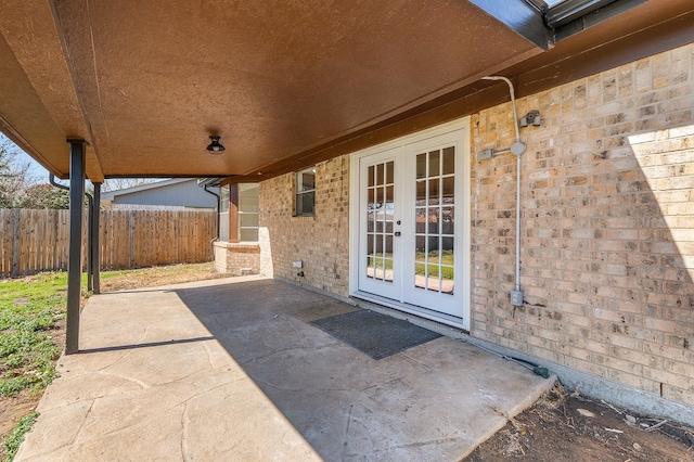 view of patio with fence and french doors