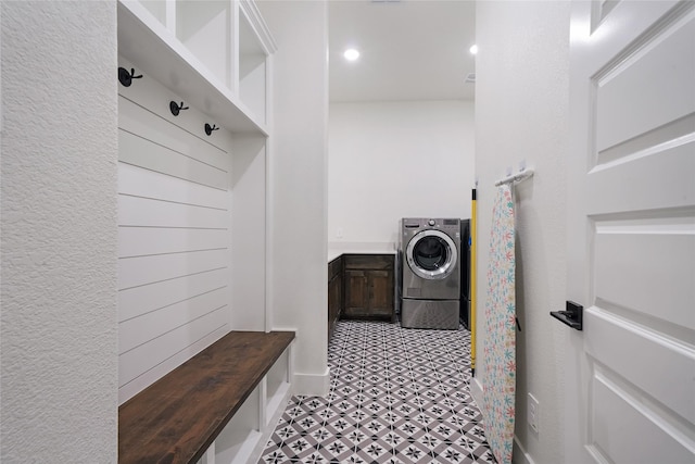 mudroom featuring washer / dryer and light floors