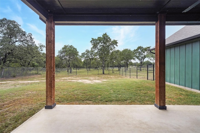 view of yard featuring a patio area and fence