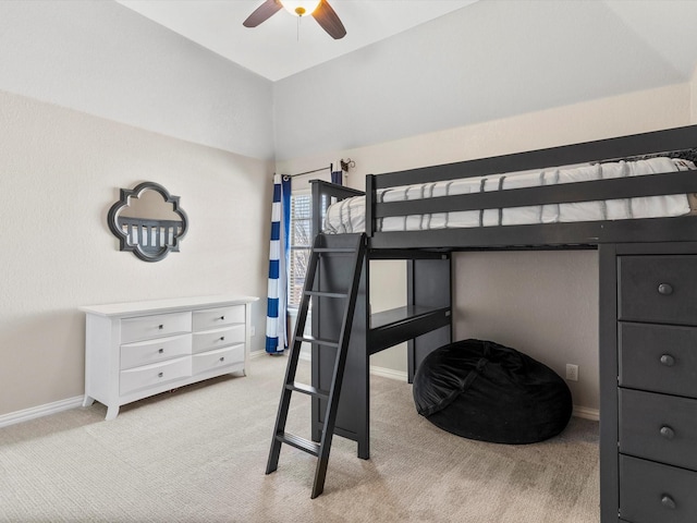 bedroom with baseboards, ceiling fan, and light colored carpet