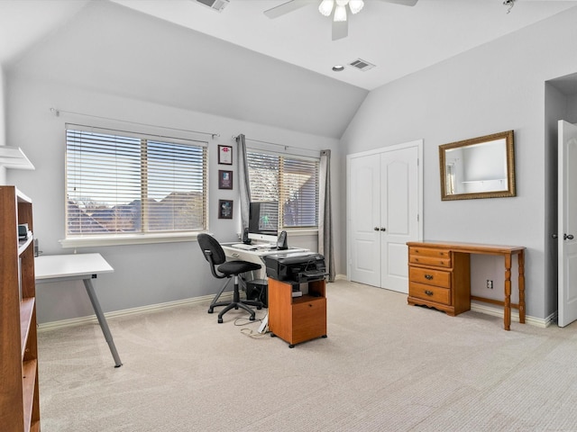 carpeted office featuring vaulted ceiling, a ceiling fan, visible vents, and baseboards