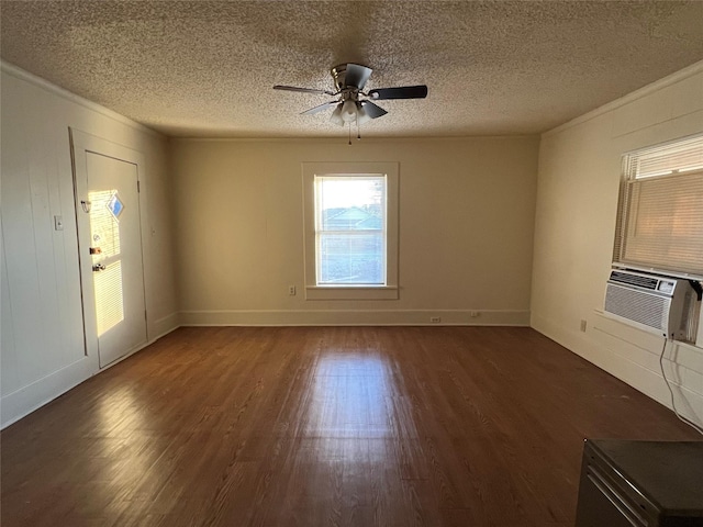 unfurnished living room with ceiling fan, a textured ceiling, cooling unit, and wood finished floors