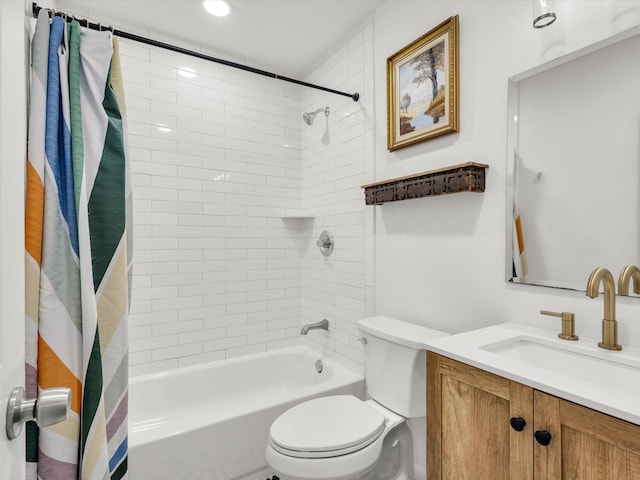 full bath featuring vanity, shower / bath combination with curtain, and toilet