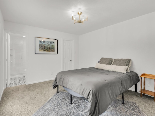 bedroom with baseboards, carpet flooring, connected bathroom, and a notable chandelier