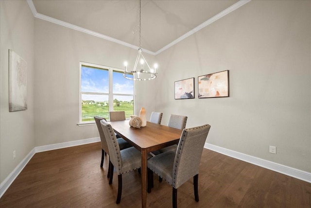 dining room with baseboards, dark wood-type flooring, a chandelier, and crown molding