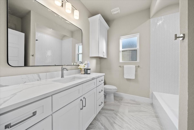 bathroom featuring vanity, baseboards, walk in shower, toilet, and a bathtub