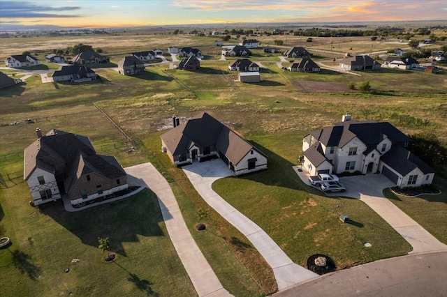 aerial view at dusk with a residential view