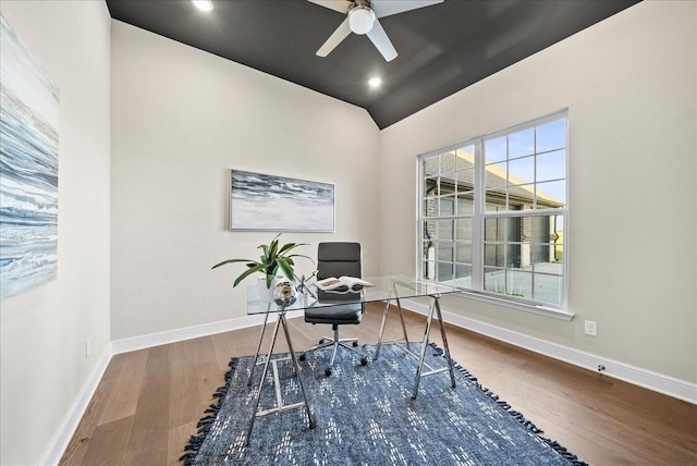 office area with a ceiling fan, wood finished floors, baseboards, lofted ceiling, and recessed lighting