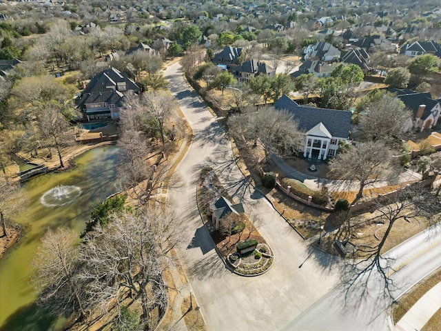 birds eye view of property with a residential view