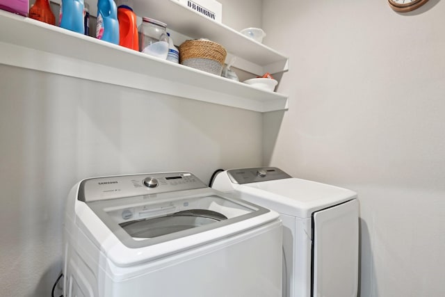 laundry area with laundry area and washing machine and dryer