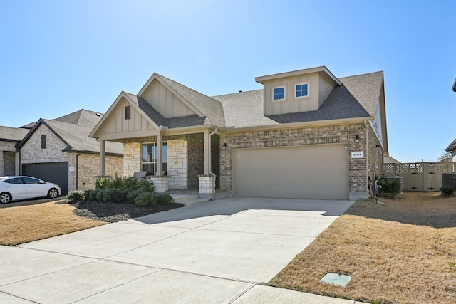 view of front of home with a porch, an attached garage, board and batten siding, and driveway