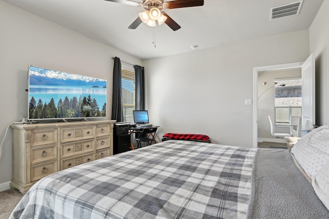 bedroom featuring a ceiling fan, baseboards, and visible vents