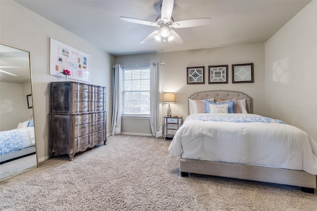 bedroom with carpet floors, ceiling fan, and baseboards