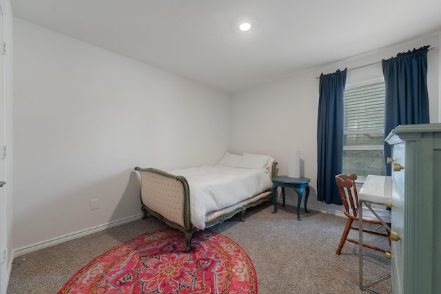 carpeted bedroom with baseboards and recessed lighting